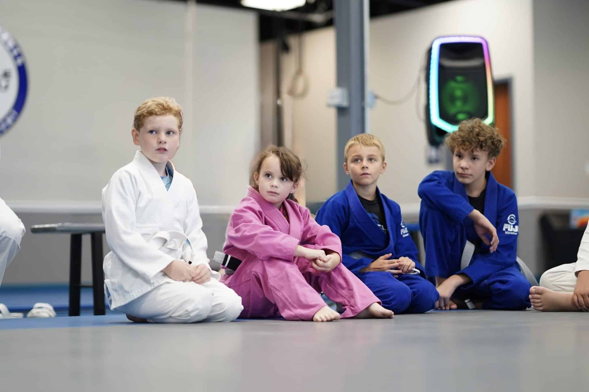 little tigers students sitting on mats during bjj lesson at Pinnacle Jiu Jitsu